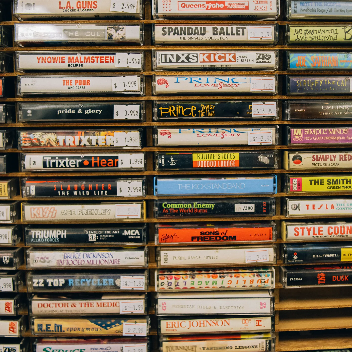 Cassette rack with priced tapes. Any Jungle