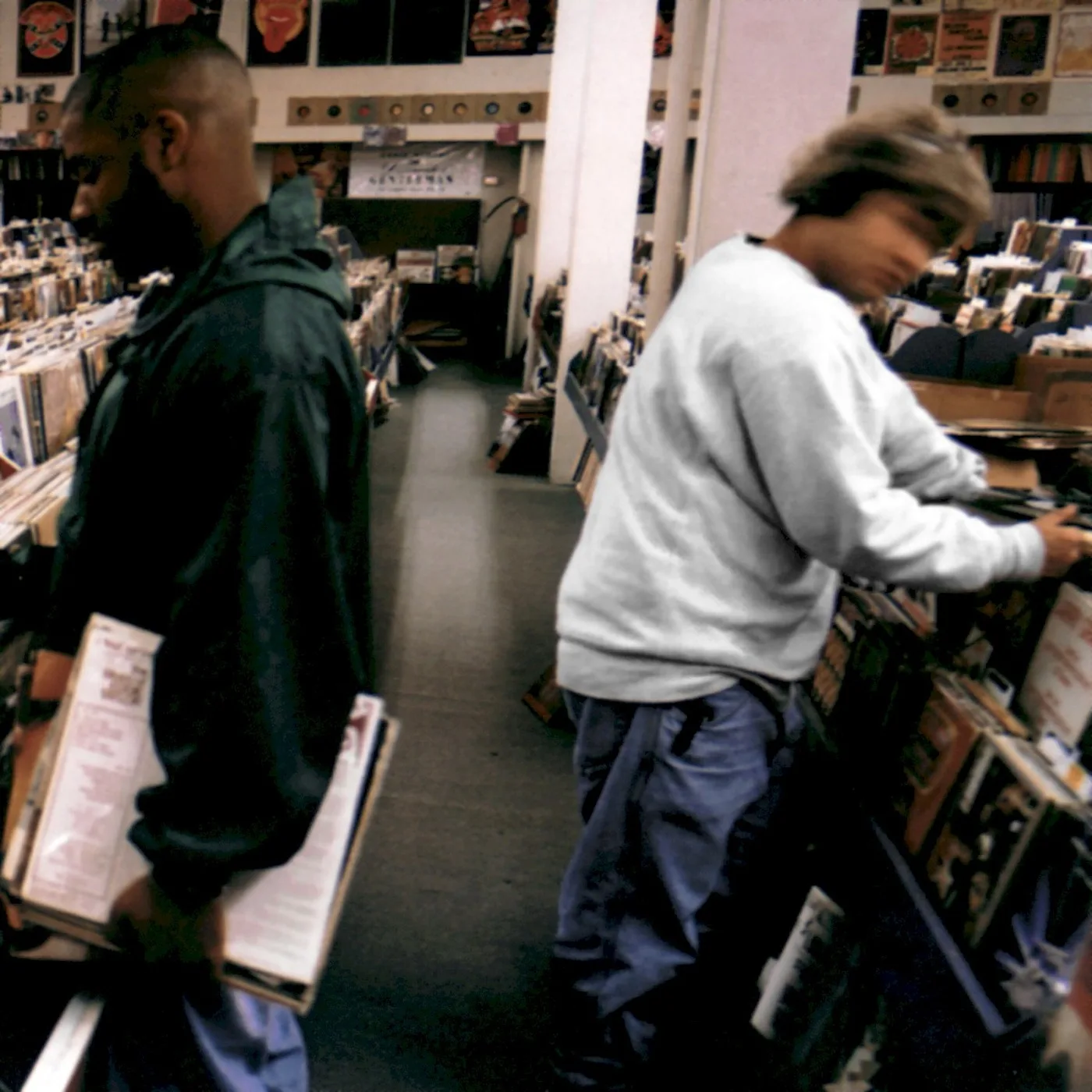 DJ Shadow Endtroducing album cover. crate diggers in a record shop