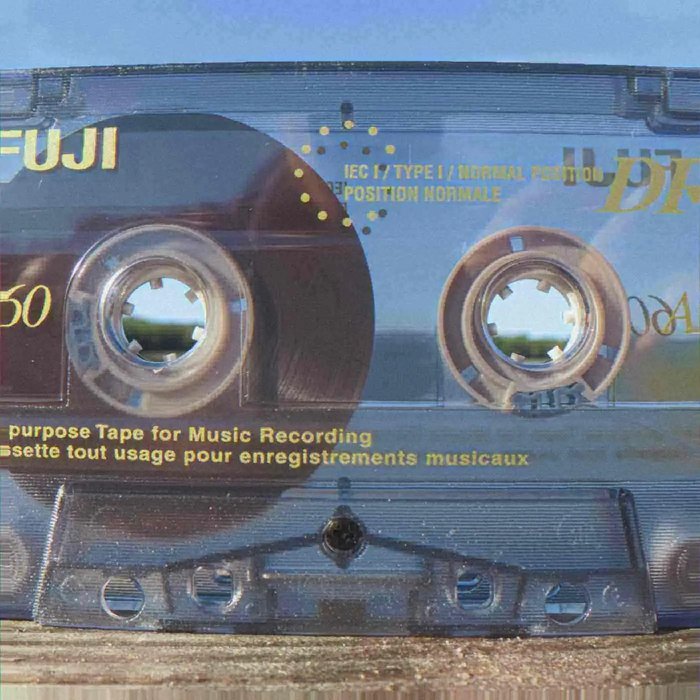 A Fuji compact cassette on a ledge. You have to flip it. Photo: R. Henrik Nilsson, CC BY 4.0.